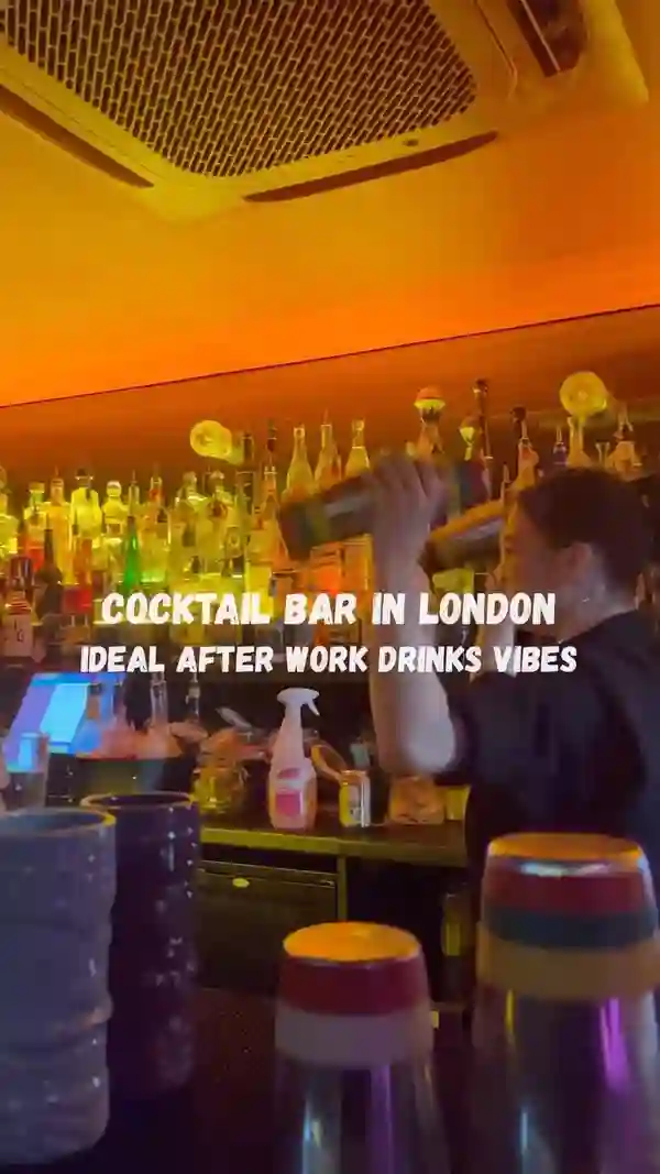 The video showcases Tequila Mockingbird, a cocktail bar in London. It highlights the bar's atmosphere, drink preparation, and the final cocktails served to two women. The cocktails include a purple and a light blue tiki-style drink with garnishes and a red-colored cocktail in a rocks glass. The video emphasizes the vibrant ambiance and the strong, tasty cocktails.