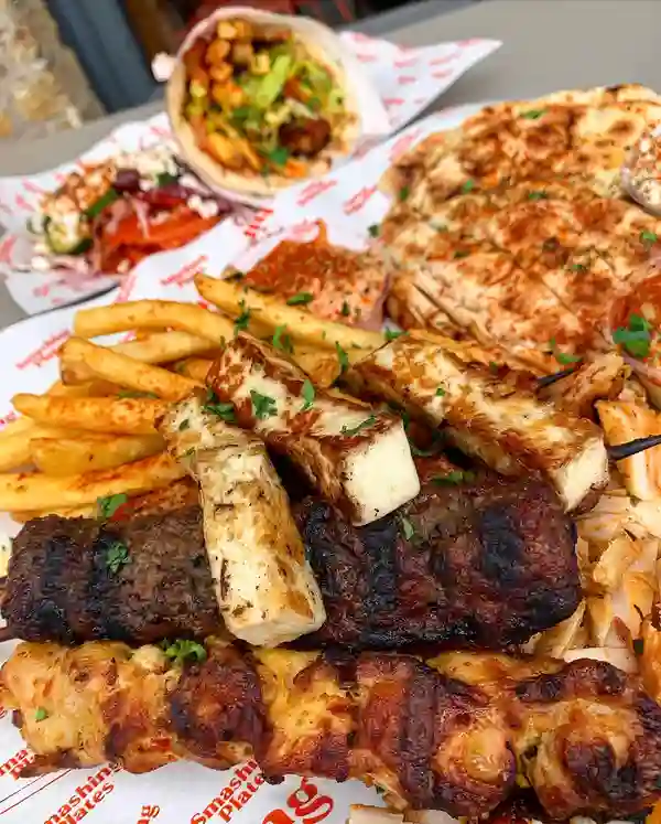 🇬🇷GREEK FEAST-SMASHING PLATES🇬🇷
📍Smashing Plates, London Bridge, London
@smashingplatesuk via @nibbleapp
#GreekFoodDate🍴

Thank you for inviting us! 

You have to try the new menu at Smashing Plates! Their Souvlaki and Gyros are to die for! 😍😍
Whether you choose to have a tray full of food or a wrap that’s packed with flavours, you’ll be left feeling satisfied 🤤 @smashinplatesuk is here to serve you authentic greek flavours! The tray ‘Grilled Feast’ has that wow factor because of the variety that’s included in it 😍 It’s a great way to try a bit of everything that’s on the menu including chicken gyros, pork skewer, chicken skewer, ground mixed lamb & beef, pork sausage and halloumi accompanied by crunchy slaw, oregano fries, pitta and a choice of 2 dips! 🤩 Another dish we tried was the Chicken Souvlaki wrap which is a Grilled chicken thigh skewer marinated in Greek herbs wrapped in handmade Greek pitta with freshly cut lettuce, tomatoes, red onions, parsley, oregano fries and 1 of Smashing Plates’ homemade dips! We had a Greek Salad on the side which was very light and fresh! 🌱 For dessert, we enjoyed Baklava (who doesn’t love baklava?!) and also Pittanuts which we’ve never tried before! The Baklava was veryyy sweet & delicious and the Pittanuts was very crispy and also super sweet as it’s topped with maple syrup 🤤 

Head over to your nearest Smashing Plates for a Greek feast you won’t forget! 

#smashingplatesuk #nibbleapp