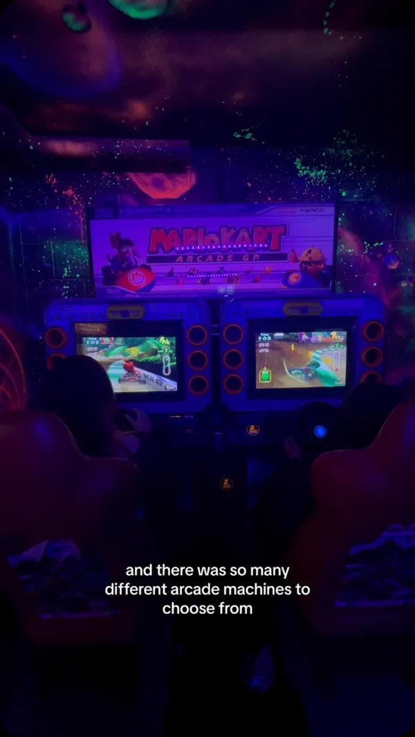 This video showcases NQ64, an arcade bar in Glasgow.  The vlogger describes being given tokens and drinks upon arrival. A mocktail is featured, and the video shows various arcade games available. The main focus is the overall experience of the arcade bar, including gameplay and the venue’s atmosphere.