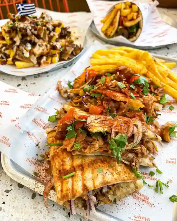 🥗🌯 GREEK ON THE GO 🌯🥗

Had this delicious Greek feast at @smashingplatesuk ♥️.

We ordered the chicken skepasti gyros with fries and drink (£15.10), unorthodox fries with pork gyros + extra mushroom (£10), lamb & beef souvlaki wrap meal deal with smashing sauce, extra halloumi, greek salad + water bottle (£13.45) and the chocolate pittanuts (£4.50).

You order through the interactive screens and choose whether to eat in or take out. There was so many yummy choices, perfect for meat eaters and for those who are vegetarian/vegan 🌱 . We absolutely loved the skepasti, Greek salad & chocolate pittanuts 😍 however found the pork gyros on the unorthodox fries a bit over cooked and salty.

📍 @smashingplatesuk | London Bridge branch
✨ Like, save & share to support my page 💖

[invite - @nibbleapp ]
.
.
.
#greek #greekfood #greekstreetfood #streetfood #londonfood #londonfoodie #londonlife #londonrestaurant #foodblogger #foodporn #foodie #foodpics #londoneats #wheninlondon #londonhotspots #explorepage #discoverunder10k #timeoutlondon #healthyfood #healthylifestyle #toplondoneats #londonbridge #eatlondon #london4all #cheapeats