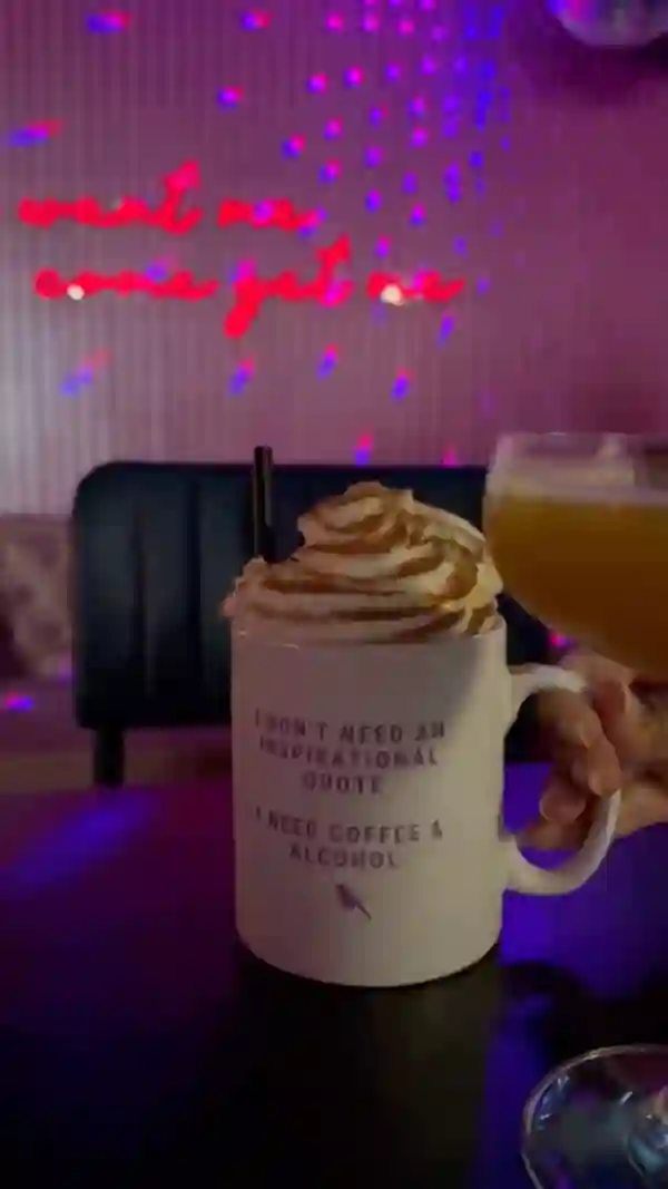 The video showcases Tequila Mockingbird, a bar in London. It features the preparation of several cocktails, including a flaming Tiki-style drink and a yellow cocktail garnished with passion fruit. The bar's ambiance is highlighted, with neon lighting and a vibrant atmosphere. The video focuses on the cocktails and the bar's lively environment.