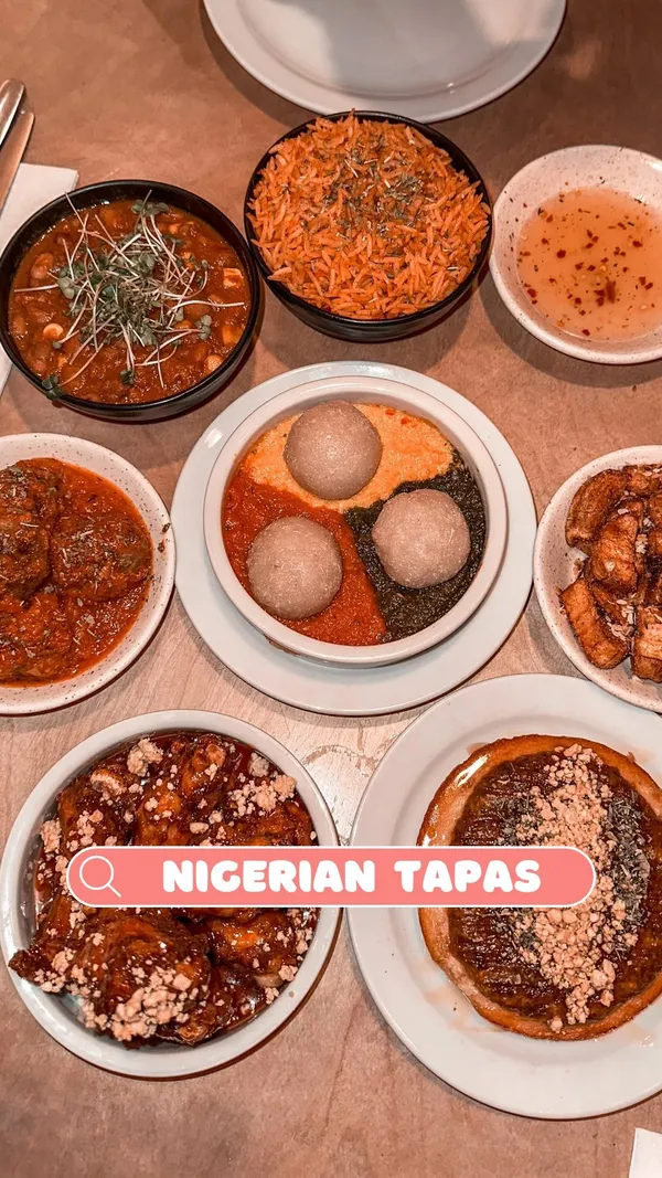 The video showcases Chukus, a Nigerian tapas restaurant in North London. It features various dishes, including plantain (both as a main dish and in waffles), jollof rice, adalu (honey bean stew), sinasir & miyan taushe (rice pancakes with pumpkin-peanut stew), egusi bowl (cassava dumplings with stew), suya meatballs, and kuli kuli wings. The video also shows a chapman punch. The presentation emphasizes colorful dishes and close-ups of textures. Dietary options like vegan, gluten-free, and halal are mentioned. The main focus is on the variety and appeal of the restaurant's Nigerian tapas.