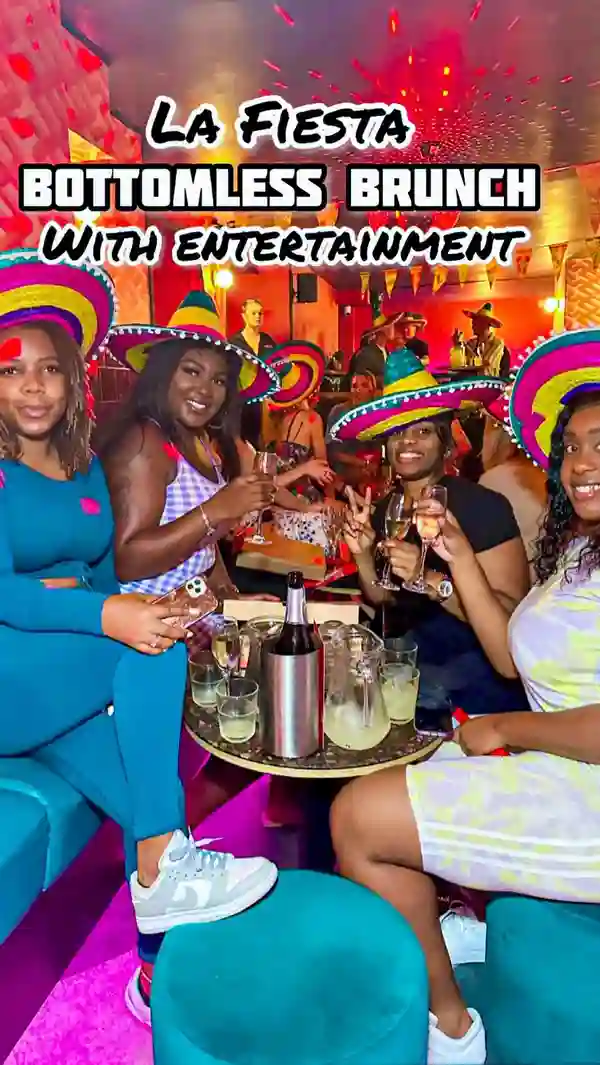 This video showcases a 90-minute bottomless brunch fiesta at Tequila Mockingbird in London.  It highlights the venue's vibrant atmosphere, featuring various entertainment acts (dancers, piñata smashing), games (limbo, Name That Tune), and the provision of bottomless Prosecco, margaritas, and beer, alongside pizza. The video emphasizes the fun, social aspect of the event, with numerous shots of people dancing, enjoying drinks, and participating in activities.  The pizza is shown to be pepperoni and appears to be standard pub fare.