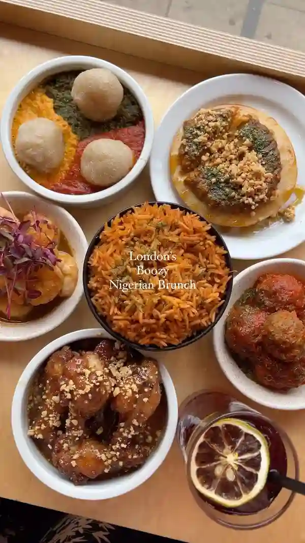 The video showcases a Nigerian brunch at Chuku's in London. It features various dishes including honey suya prawns, caramel kuli kuli wings, suya meatballs, an egusi bowl with cassava dumplings and stews, jollof rice, and sinasir with miyan taushe (rice pancakes with peanut and pumpkin stew).  The drinks shown are a dark-colored, likely boozy, beverage.  The presentation is visually appealing, with close-up shots emphasizing the food's textures and colors. Dietary information indicates the availability of meat, vegetarian, gluten-free, and vegan options.