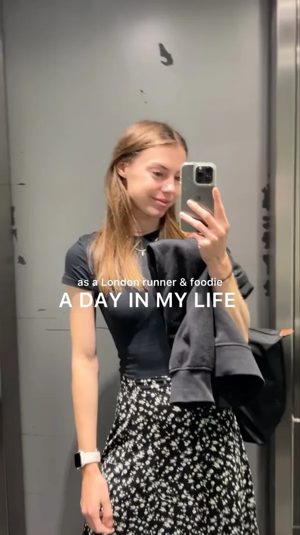 The video follows a day in the life of a London runner and foodie. It starts with her morning run, then shows her eating a pre-work meal, working at her office, and then having a tapas dinner date at Ember Yard restaurant. The food shown includes various tapas dishes: roasted peppers, a tomato salad with a breaded cheese croquette, prawns in a sauce, grilled cabbage with nuts and shallots, a chicken dish with a purée, and a dessert mille-feuille. The video is filmed from a first-person perspective, offering a personal and engaging glimpse into her daily routine.  Dietary information is not explicitly provided.