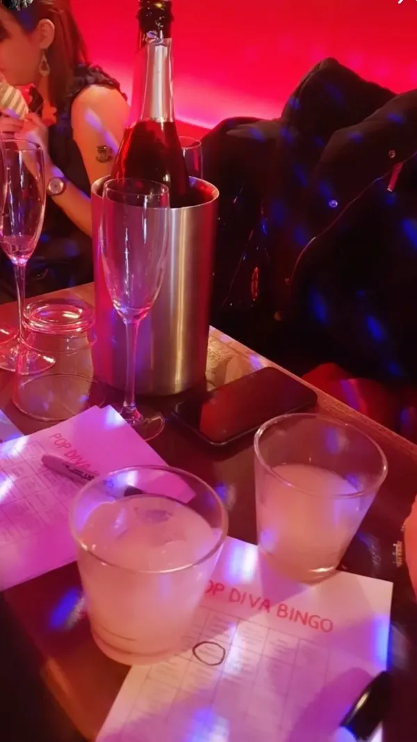 The video showcases a bottomless brunch event at Tequila Mockingbird in Shoreditch, London.  It features groups of women enjoying the brunch, including food (pizza), drinks, glitter face tattoos, and dancing. The atmosphere is vibrant and party-like, with a focus on the fun and social aspects of the event.