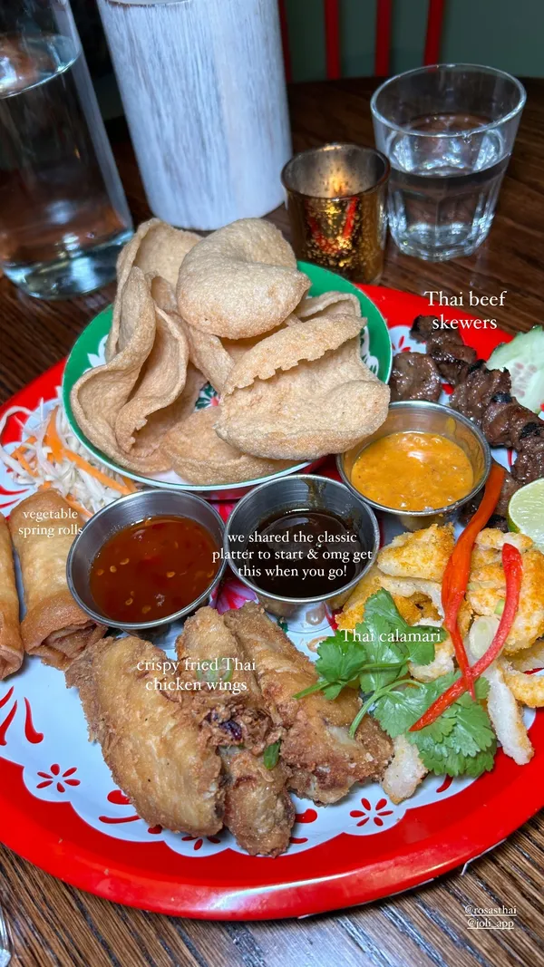 we shared the classic platter to start & omg get this when you go!  crispy fried Thai chicken wings  vegetable spring rolls  Thai calamari  Thai beef skewers  @rosasthai 
@joli_app