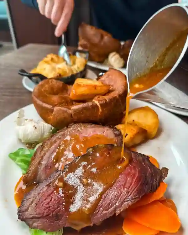 This has been rated the UK’s BEST SUNDAY LUNCH: @hawksmoorrestaurants 🥩✨🥂

Absolutely beautiful food & lovely interiors. I have wanted to try out Hawksmoor for AGES, especially their Sunday roast! The @obsfood rated it the best Sunday lunch in the UK - and it defo didn’t disappoint!! 

We visited the Wood Wharf restaurant, in @canarywharflondon . Which is also home to @thelowbackbar . We waited here for our table & the bar was lovely! You can also eat here for a more relaxed vibe. 🥂

What we had:

STARTERS - Oysters & Roasted Scallops: both delicious! 🦪

MAIN - Beef Rump Roast with all the trimmings & sides of cauliflower cheese and stuffing: it was a very tasty roast dinner & the gravy was so good too. The beef was cooked lovely, few chewy bits but very tasty. 🥩

DESSERT - Sticky Toffee Pudding with clotted cream. This was a showstopper, it was SOOO good!! And I would say I’m a sticky toffee connoisseur LOL. 😍

Loved it! Would love to go back for their all day a la carte menu too.

Have you been to Hawksmoor? Add it to your lists! 

PR Invite @joli_app 

#sundaylunch #londonrestaurants #roastdinner #hawksmoor #canarywharf #canarywharflondon #beefroast #londonfoodie