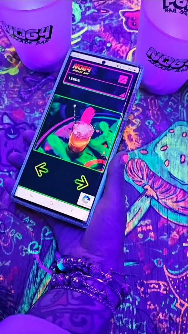 📍@nq64arcadebars
📍@joli_app

Looking for some spooky fun this halloween? Get yourself down to the retro games arcade that is NQ64 on Merrion Street in Leeds, where all the fabulous bar staff are dressed up for the occasion to sling out your favourite cocktails

NQ64 is a gamers heaven with all of the best old school arcade games such as Pac Man and Street Fighter, as well as the Car racing games, Basketball, Dance Mat, Guitar Hero and a huge selection of Consoles and Gameboys. Most of the games require 1 or 2 tokens to play but the consoles and game boys are all free to play when you buy a drink. Now lets talk about the drinks menu as they have put some real thought into that by creating cocktails to match the theming of the arcade

🤎Golden Iced Latte (Havana Rum, Licor 43, Butterscotch, Espresso, Butterscotch Foam)🤎

If you have had the pleasure of visiting Universal Orlando, this tastes like an alcoholic version of Butterbeer! If you know you know Harry Potter fans

💛Lemmingade (Limoncello, Absolut Citron, Lemon, Pink Hooch, Prosecco, Rosemary, Cucumber)💛

I am pleasantly surprised that Limoncello keeps popping up even though summer is long gone- this was a banging Spritz and fun fact I was obsessed with the Lemmings game as a kid!

💙Disco Stu Daiquiri (Duppy White Rum, Blue Bubblegum, Lime)💙

Bubblegum Daiquiri- say no more, sweet tooth heaven!

❤️Royal Crumble (Jack Daniels Apple, Lime, Rhubarb, Custard, Crumble)❤️

If you love the retro Rhubarb and Custard Sweets or a warming winter Crumble then this one is for you!

We had a lot of fun trying out all of the different games- I can still just about keep up with the dance mat and Brett smashed it out of the park shooting hoops on the basketball game. The car racing games reminded me why I still don’t have a driving license and Brett was living his best life defeating the villains in Street Fighter. If you love your old school Hip Hop music then this place will have you singing along while you drink and game. Shout out to the fabulous bar staff for their epic Halloween attire and all round amazing energy

*Invite