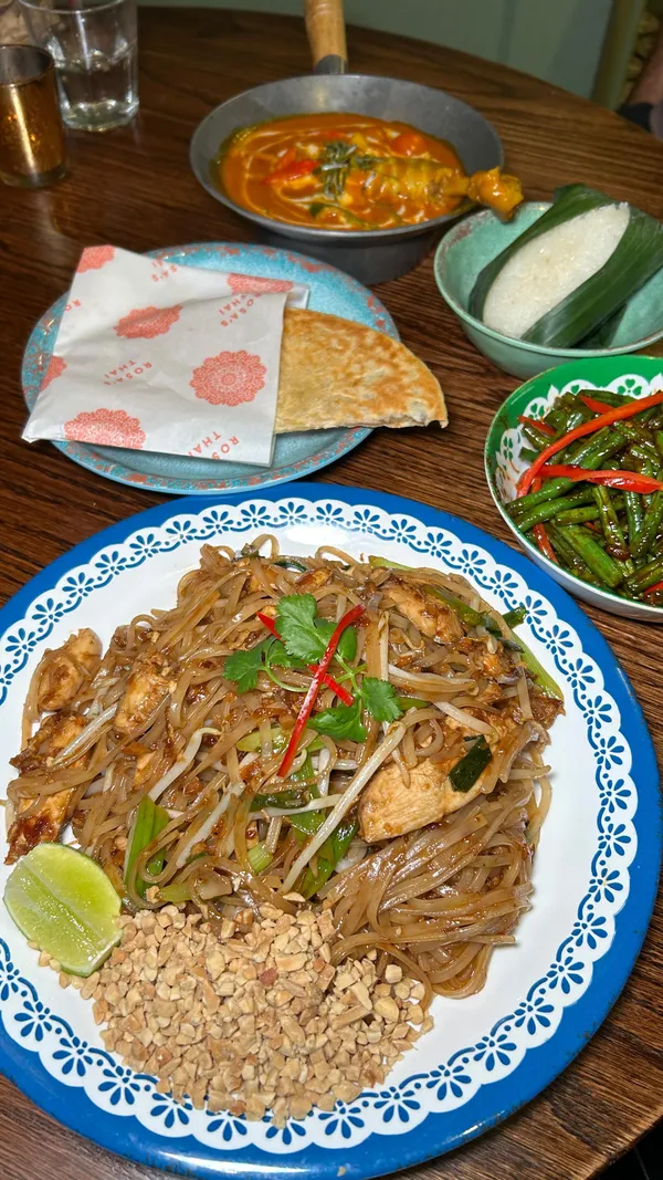 NATIONAL PAD THAI DAY - ROSA’S THAI 🇹🇭🥢🍜🍤 

To celebrate National Pad Thai Day (tomorrow!) @rosasthai are offering an amazing deal - if you think their Pad Thai is not the best Pad Thai you’ve ever had - you’ll get your money back! 🤯
And if it IS the best - they’ll give you a postcard for a free pad Thai on your next visit 🙌🏼 a win win situation 😉

I can confidently say this is definitely the best I’ve had - very bold statement but I stand by it 🤭

We had an absolute FEAST: 

Started off with some drinks: a lychee ginger spritz 🍹 and a pint of Singha 🍺 

Then onto the food:
- The Classic sharing platter - Thai fried chicken wings, veggie spring rolls, grilled pork skewers, Thai calamari & prawn crackers with sweet chilli sauce, satay sauce & tamarind dipping sauce - unreal - you’ve HAVE to get this 😍
- The Chicken Pad Thai - THE BEST 🤌🏼
- Gaeng Dang Supparod Ped - Red Duck pineapple curry - this was sooo flavoursome and fragrant 
- Sticky rice, roti bread & spicy green beans - all delicious 🤤 

This promotion is only on 7th November - so get yourself there tomorrow and see for yourself- the best Pad Thai you’ve ever had - or your money back 🤝🏼 

Ad|Invite @joli_app 

🔎 National Pad Thai Day, Thai Glasgow, Glasgow restaurants, Glasgow food