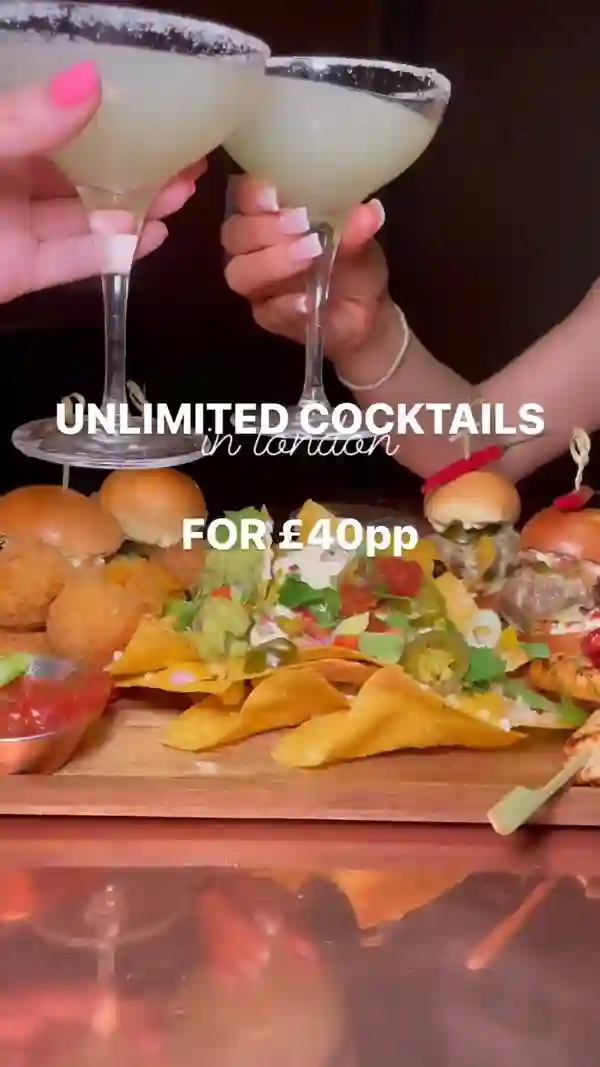 This video showcases a "bottomless fiesta" deal at Dirty Martini in London. The deal includes unlimited Prosecco, beer, cocktails, and gin, along with a Mexican sharing platter. The platter features nachos, mini burgers, chicken skewers, and various dipping sauces. The video uses a mix of overhead shots and close-ups to highlight the food and drinks.