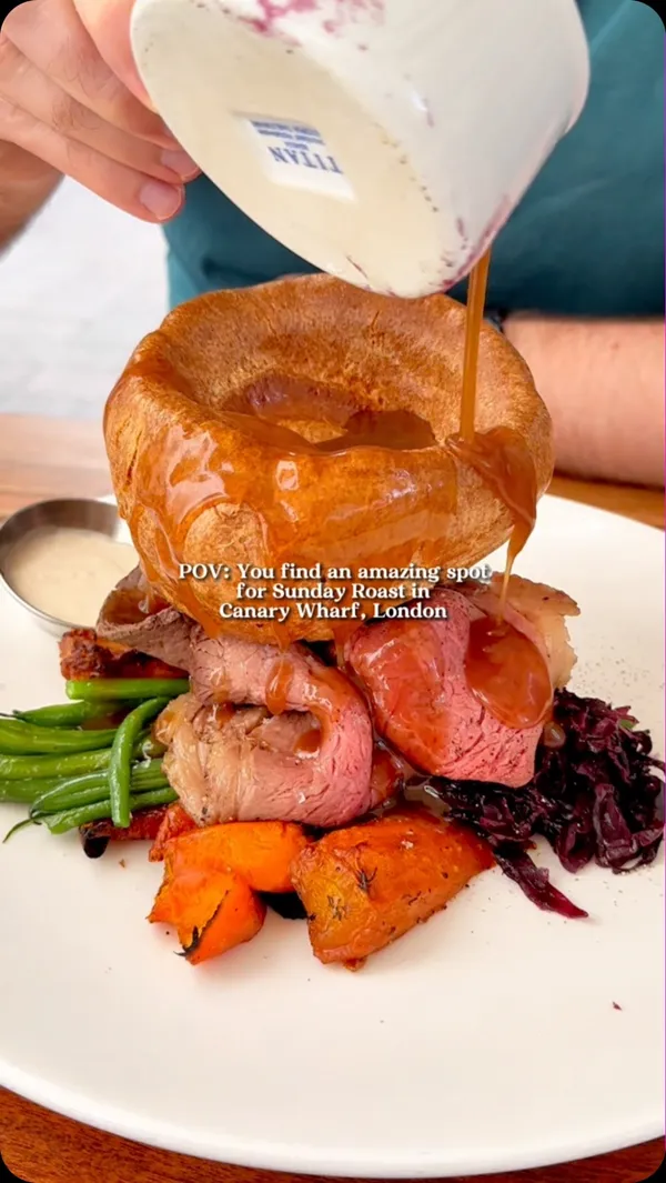 The video showcases No. 35 Mackenzie Walk, a restaurant in Canary Wharf, London, specializing in Sunday roasts.  It features various dishes including roast beef with Yorkshire pudding and gravy, roast chicken, mac and cheese, and cocktails. The presentation emphasizes high-quality ingredients and visually appealing plating. Dietary information is not explicitly provided. The primary focus is a showcase of the restaurant's food and ambiance.