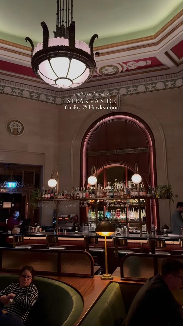 The video showcases a January promotional offer at Hawksmoor restaurant in Liverpool, featuring a £15 steak and a side dish. It shows various food items such as steak, chips, sticky toffee pudding, and drinks. The presentation is well-lit and appealing, highlighting the quality of food and restaurant ambiance. No specific dietary information is explicitly mentioned.