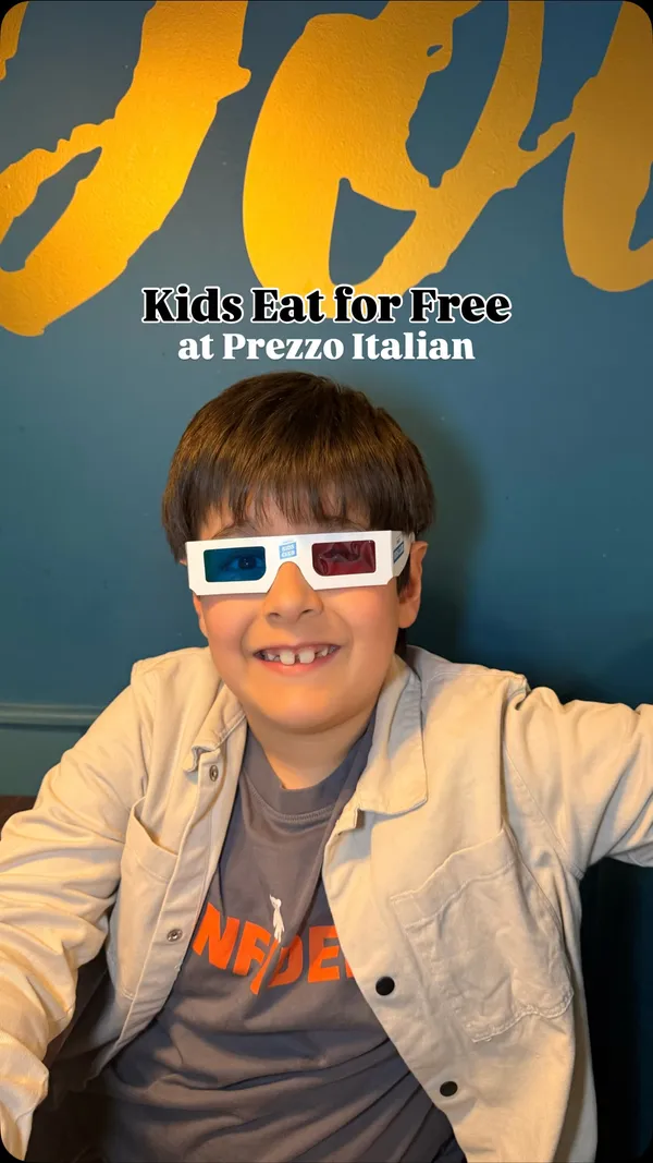The video promotes a "Kids Eat Free" subscription offer at the Prezzo Italian restaurant chain. It features a family with two children enjoying a meal, showcasing various dishes like pasta with meatballs, lasagna, calzone, and desserts. The video uses a clear voiceover and text overlays to explain the details of the £1.99/month subscription, which allows up to three children to have a free three-course meal with the purchase of one adult main. The overall theme is a happy, affordable family dining experience.