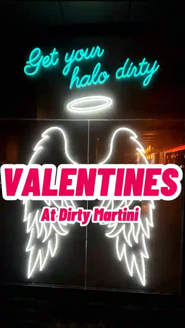 This video showcases Valentine's Day cocktails at Dirty Martini bars in London.  It features four cocktails: Love Affair (Absolut passionfruit vodka, Briotett apricot liqueur, Campari, pineapple, citrus & egg white), L’Amour (Absolut vodka, Chambord & Supasawa), Strawberry Kiss (Beefeater pink strawberry gin, coconut, strawberry, Paragon cordial, citrus & Ms Betters bitters), and Pillow Talk (Absolut vanilla vodka, Mozart white chocolate, Chambord, cream & Ms Betters bitters). The cocktails are presented in various coupe glasses and martini glasses, garnished with fruits and edible glitter.  The video is filmed in the bar setting, highlighting the ambiance and neon signs. The main focus is on the cocktails and their promotion during a specific Valentine's period.