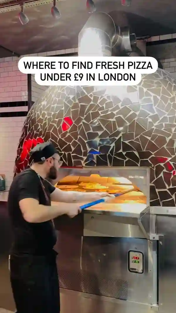 This video showcases Pizza Union, a pizza restaurant in London.  It highlights two pizzas: the Regina (tomato sauce, mozzarella, parmesan, ham, mushrooms, black olives) and the Formaggi (tomato sauce, mozzarella, parmesan, mascarpone, gorgonzola). The video emphasizes the pizzas' thin and crispy crust, and their preparation in a wood-fired oven. The setting is primarily the restaurant's kitchen and a table where the pizzas are enjoyed.  No dietary information is explicitly provided.