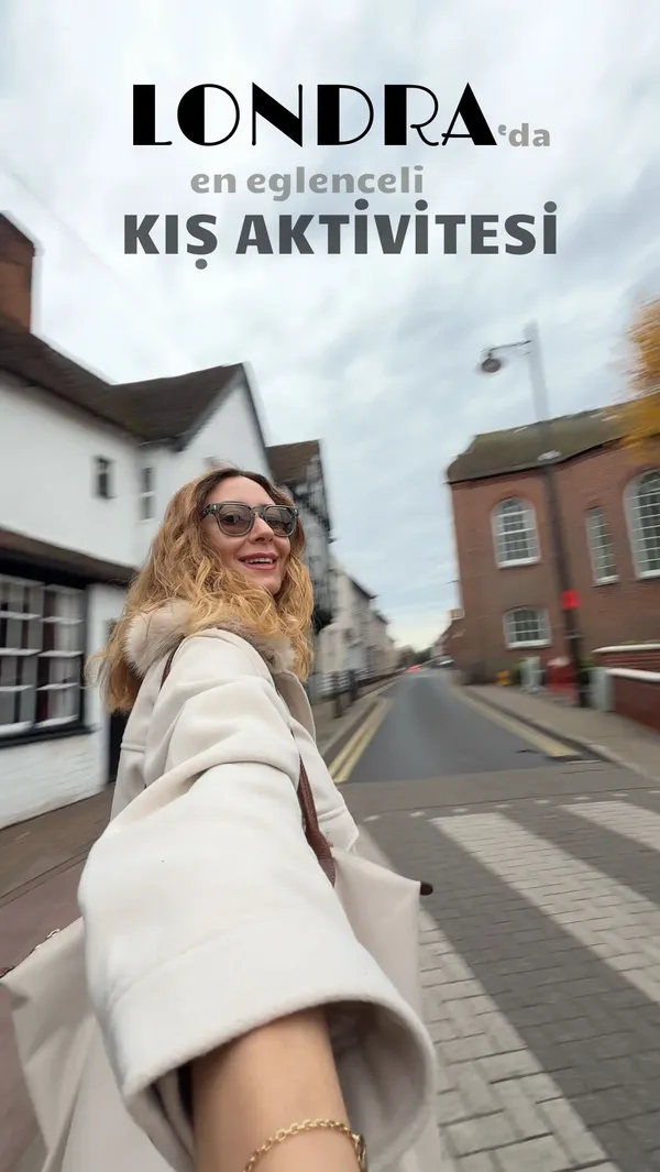 The video promotes a pub in Covent Garden, London, as an ideal winter activity. It showcases a 'Big Game Brunch' deal which includes unlimited prosecco and large sharing platters of bar food. The food shown includes mini burgers, curly fries, onion rings, fried chicken, and various vegetables with dipping sauces. The main focus is on the social and fun atmosphere, with the creator and her friends shown playing shuffleboard and pool, drinking prosecco, and enjoying the food.
