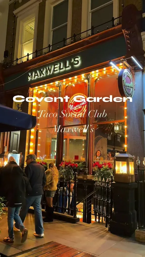 The video showcases an evening at Maxwell's Bar & Grill in Covent Garden. It begins with an exterior shot of the restaurant at night, followed by a series of clips featuring their food and drinks. Items shown include a pink watermelon margarita with a spiced rim, tacos being eaten by a patron, and a plate of churros served with a chocolate dipping sauce. The overall atmosphere is lively and social.