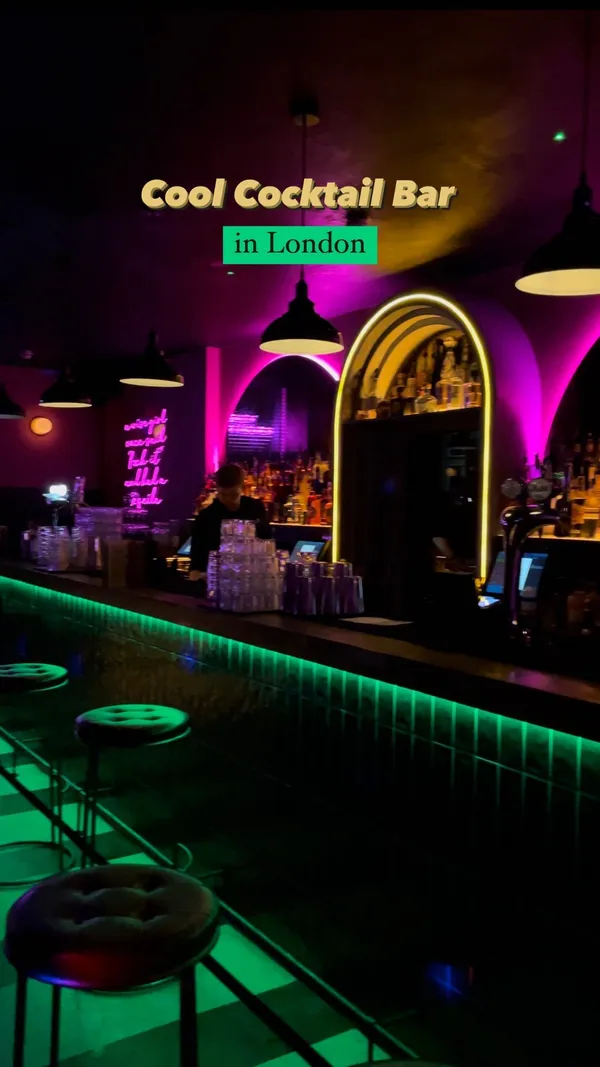 The video showcases Tequila Mockingbird, a cocktail bar in Covent Garden, London. It features various cocktails, including the Mockingbird Zombie (flamed and garnished with gummy bears), Berries & Cream Martini (with fresh raspberries), Foursome, and Jet Pilot.  The presentation focuses on the vibrant colors of the drinks and unique garnishes like cotton candy. The bar's aesthetic is highlighted through shots of its neon lighting and decor.  No specific dietary information is provided.