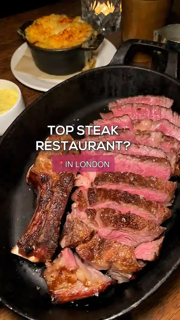 The video showcases Hawksmoor Wood Wharf, a steak restaurant in Canary Wharf, London. It features various dishes: Old Spot Belly Ribs, scallops with white port and garlic butter, prime rib steak, bone marrow gravy, mac and cheese, beef dripping fries, rum bread and butter pudding, and a chocolate tart.  The presentation is elegant and focuses on appetizing close-ups and overhead shots of the food. No specific dietary information is provided. The main focus is showcasing the restaurant and the meal experience. 