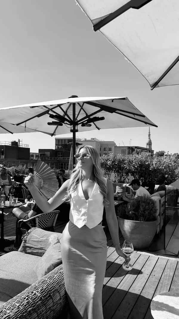 A fast-paced montage video showcasing a food content creator's recent visits to various London establishments. The video features multiple restaurants including Smiths of Smithfield (steak, burrata, dessert), The Grill Room at Hotel Cafe Royal (lobster), 32 Old Town (pasta, flatbread), Bob Bob Ricard (caviar, fish), Camino (Spanish tapas), Riviera (beef carpaccio, pasta), Coq d'Argent (launch party), Pear Tree Cafe (drinks with friends), El Pirata Mayfair (Spanish tapas including black rice and prawns), Sican (sushi, cocktails, gyoza), White Mulberries (brunch), and Salt Yard (Spanish-style Sunday roast). The video uses a voiceover to narrate the experience at each location, offering opinions on the food and atmosphere.