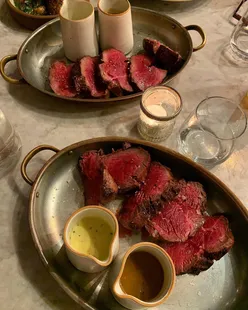 Chateaubriand steak with short rib croquettes, lemon raspberry posset, and caramelised white chocolate mousse at Pasture Cardiff.