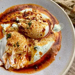 Brunch at Salt in Morningside: Turkish eggs with wild garlic yogurt, poached eggs, spiced butter, and bakery soldiers.
