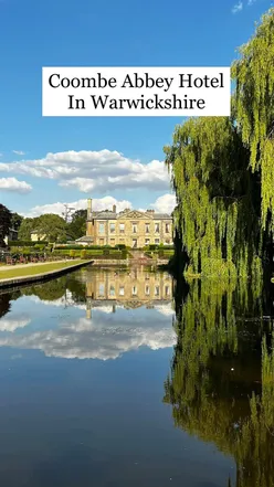 Coombe Abbey Hotel room with four-poster bed, overlooking water. Enjoy afternoon tea, scotch egg, and explore Warwickshire.