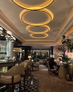 Dining at The River Restaurant in The Savoy for Mum's 60th, featuring gin cured salmon, treacle pork chop, and sticky toffee pudding.