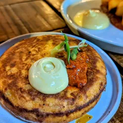Deep fried manchego and tapas specials at Bar 44 Bristol, including lamb meatballs, almond stuffed dates, and smoked duck burger.