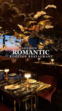 Romantic rooftop dining at @nine in London, featuring Pan-Asian dishes like lamb baos and baby chicken.