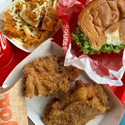 Spicy crispy chicken burger from Jollibee UK with a kick, perfect for food lovers and chicken enthusiasts.
