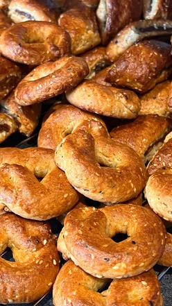 Kurdish kulîçe cookies with dates on a plate, showcasing traditional dessert flavors. #KurdishCookies #DateBiscuits