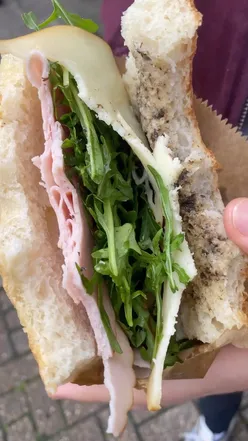 Gourmet Schiacciata sandwich with Fennel Salami, Truffle Honey, and Pecorino Cheese from Dalfiorentino in London.
