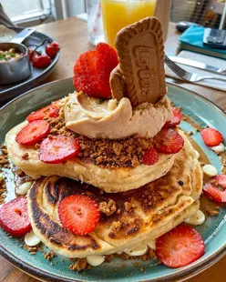 Stack of beautiful pancakes at Roasters Paisley, enjoyed with friends, capturing a delightful brunch vibe in Glasgow.