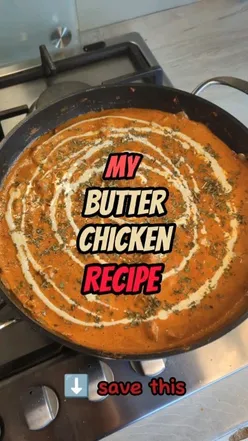 Delicious butter chicken cooking process with marinated chicken, spices, and creamy sauce in a pan.