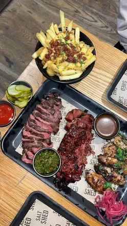 Delicious pastrami and beef steak with cheese fondue fries at The Salt Shed, North Laine, Brighton.