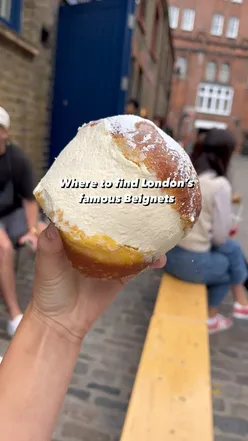 Beignet with raspberry jam and honey cream from Fortitude Bakehouse, London. Sweet treat at a popular bakery.