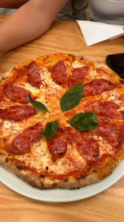 Delicious food highlights from Lisbon, featuring Asian dishes, pizza, tacos, and coffee at local markets.