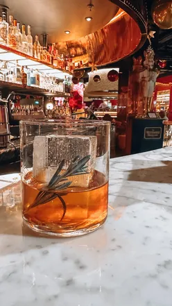 Festive cocktails and Sticky Toffee Waffle at Duck & Waffle in Edinburgh, perfect for holiday celebrations.