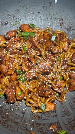 Delicious sticky honey chicken served with udon noodles, perfect for a quick 15-minute meal.