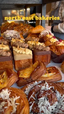 Artisan bakery with viral croissant cube, fresh focaccia, and pastries in Newcastle. Queues outside on a sunny morning.