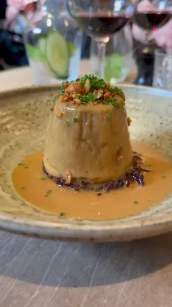 Delicious suet pudding with red cabbage at Freemasons at Wiswell, perfect for winter dining.