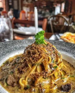 Family-run Italian restaurant Panevino in Birmingham offers Caprese salad, truffle fettuccine, seafood linguine, and 4-cheese pizza.