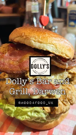 Delicious dishes at Dolly's Bar and Grill in Darwen, showcasing a vibrant dining experience and welcoming staff.