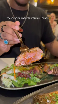 Delicious duck breast dish at Kasa & Kin, a top Filipino restaurant in Soho, London. Perfect for food lovers!