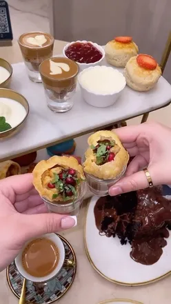 Desi afternoon tea at Chai & Chapati with chicken sliders, cheese balls, chaat, scones, and chai.