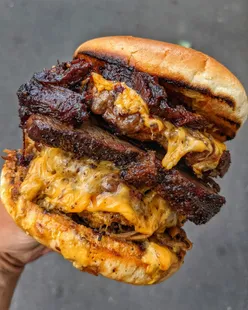 Juicy double cheeseburger with bacon, pulled pork, and beef brisket at Bare Grills, Taunton. #burger #foodie