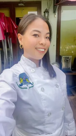 Chef Katie Tang in uniform with Principal Wong at Hong Kong Culinary Academy, cooking vegan dishes like Onion Grapes Soup and Mushroom Steak Diane.