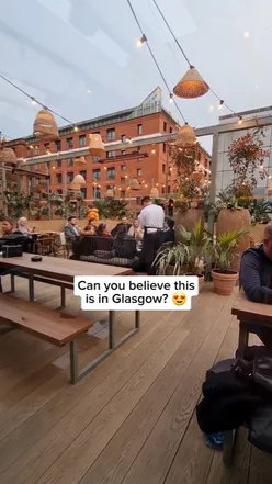 Delicious dishes served in a stunning roof garden at Kong Glasgow, perfect for lunch or dinner.